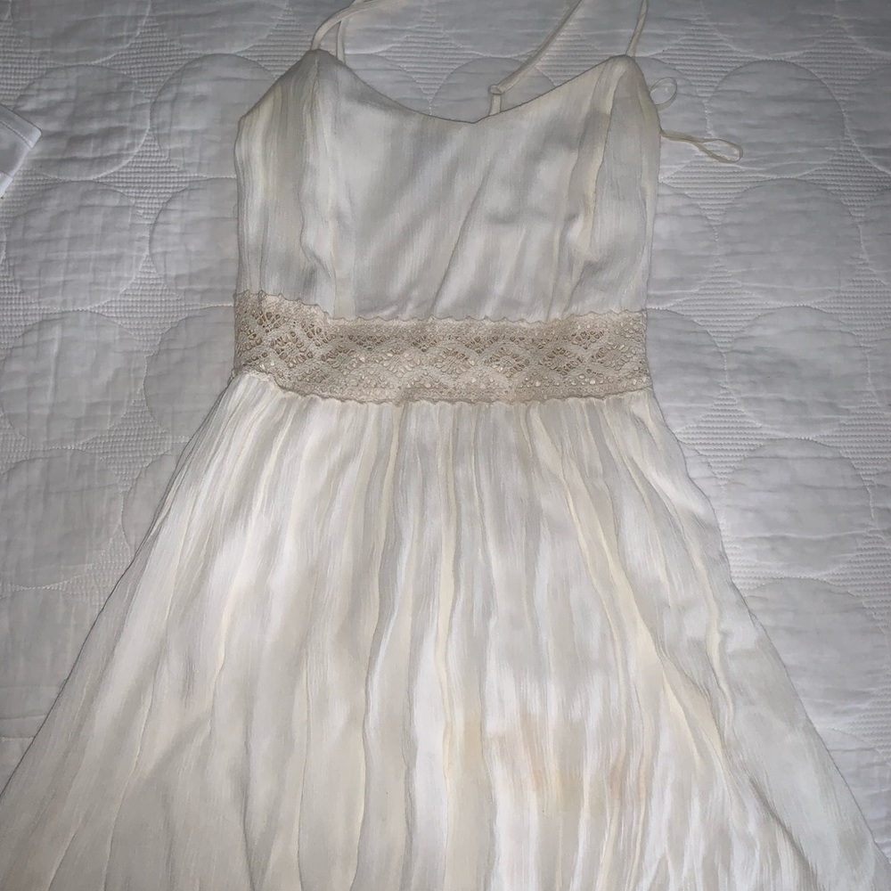 Short white crisscross strap dress
